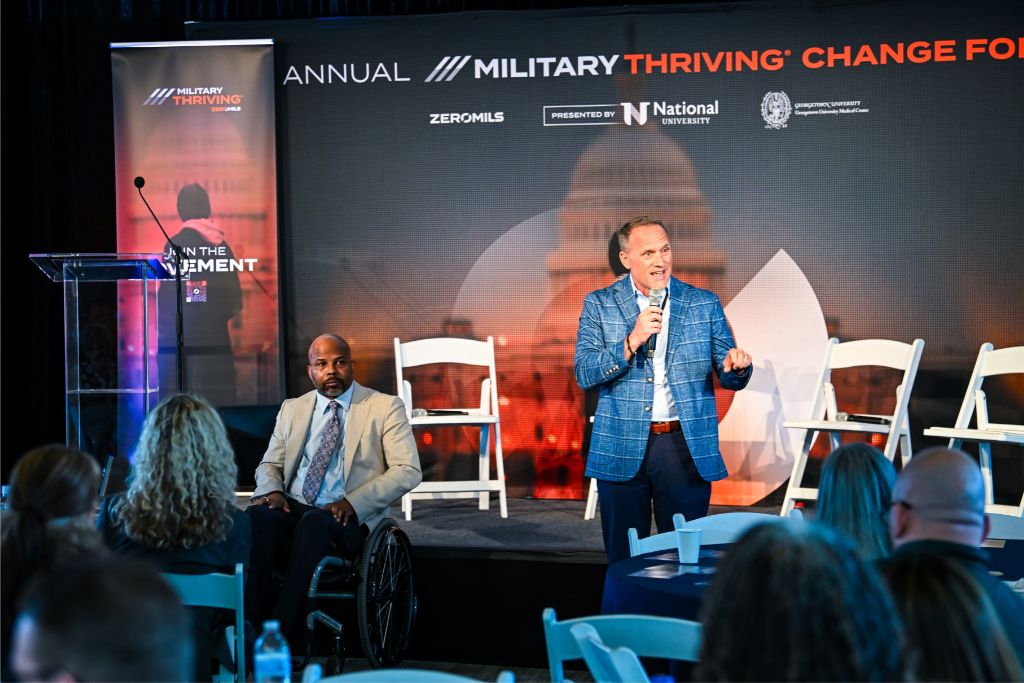 A speaker addresses attendees at the Military Thriving Change Forum at Georgetown University. Photo by Andrew Buss / Foreword Films.